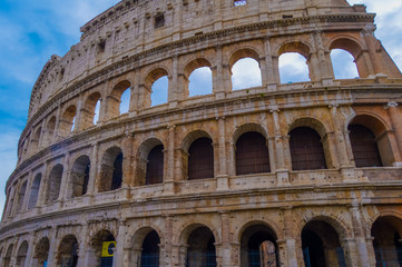 Artistic ruins of Roman Colosseum or coloseum an ancient gladiator Amphitheatre in Rome Italy