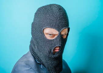 aggressive man in the mask