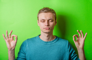 young man meditates