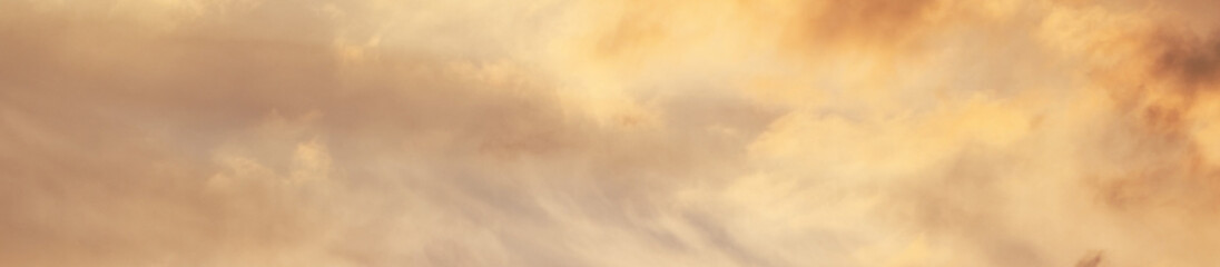 Background for a banner with a beautiful sunset sky. Beautiful clouds.