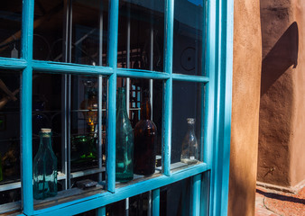 Antique Bottles in Window, Old Town Albuquerque, New Mexico, USA
