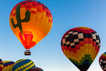 Early Morning Mass Ascension at The  Albuquerque International Balloon Fiesta, Albuquerque, New Mexico, USA © Billy McDonald