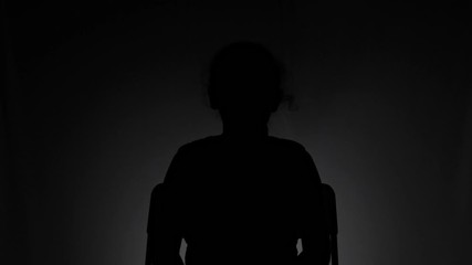 Anonymous girl interview in the dark with low light conditions