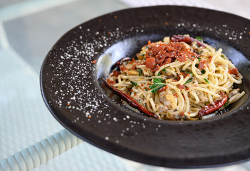 Stir-Fried Spaghetti With Clams, Dried Chili And Crispy Bacon