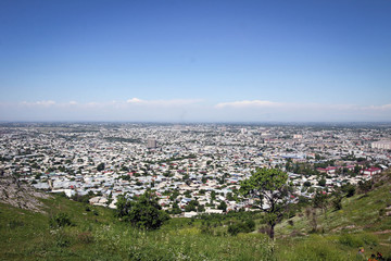 Osh town panoramic view by summer noon, Kyrgyzia