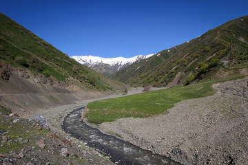 Calm green hills landscape near Jalal-Abad by spring, Kyrgyzia