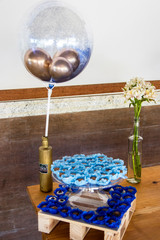 Party Setup. Sweet table with decoration and flowers 