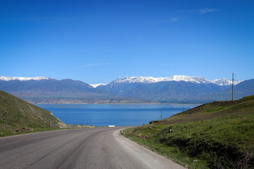 Toktogul Reservoir and Tian Shan mountains view by spring, Kyrgyzia