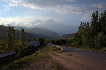 Scenic misty summer landscape near Karakol town, Kyrgyzia