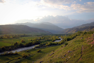 Scenic bright view of Torkent River by spring, Central Kyrgyzia