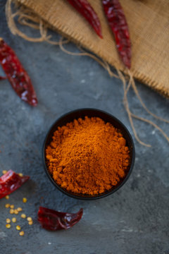 red hot chili peppers in wooden spoon