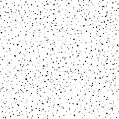 Seamless grunge texture of black speckles