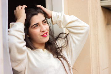 Fototapeta premium smiling woman watching the sunrise 