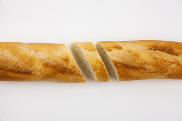 Freshly baked cut bread on a white background. For the presentation of food products, bread production and basic necessities.