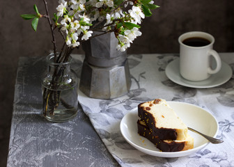 Lviv cheesecake, a traditional Ukrainian dessert with raisins, coated with chocolate icing.