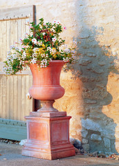 Large planter and flowers