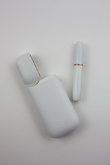 Electronic cigarettes in a white case. For the presentation of tobacco products and the work of the tobacco industry.