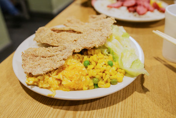 Porkchop Egg Dish with corn salad
