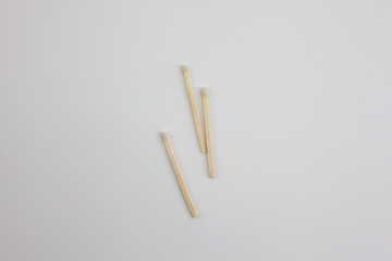 Wooden matches on a white background. A fire-making tool.