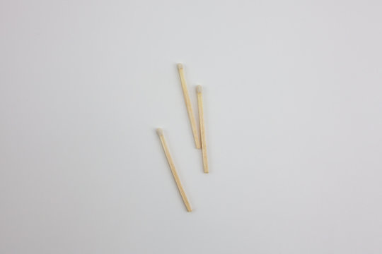 Wooden matches on a white background. A fire-making tool.