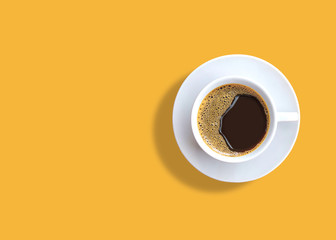 cup of espresso coffee on yellow background.