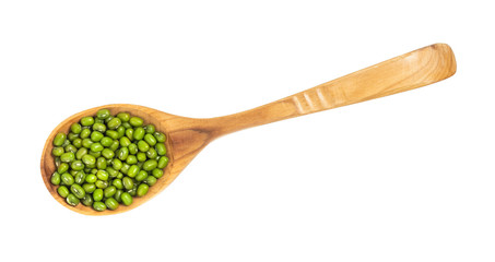 Mung beans in a wooden spoon isolated on white background