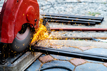 Steel cutter is working to cut sparkling steel