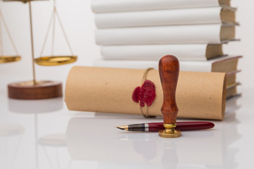 Notary's public pen and stamp on testament and last will. Notary public tools.