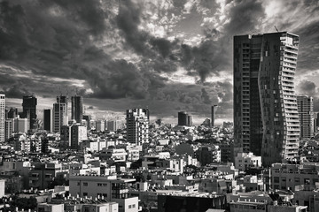 Magnificent Cityscape of Tel Aviv, in Israel in Black and White under a dramatic Sky.