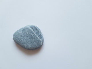 Grey stone on a white background