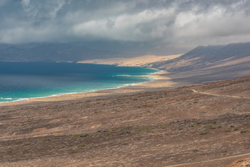 ocean and mountains in the desert of the Canary Island of Fuerteventura