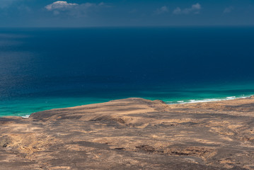 ocean and mountains in the desert of the Canary Island of Fuerteventura