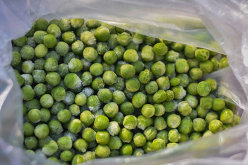 closeup of fresh green peas on the market