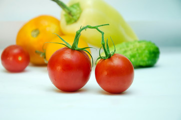 red tomatoes, fresh vegetables, background with vegetables