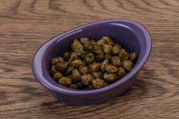Tasty capers in the bowl