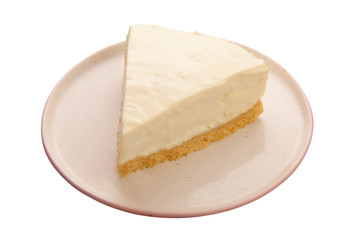 classic cheesecake on white plate on  wooden table