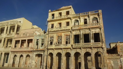 Fototapeta premium Havana is an original city with old mobiles and old houses