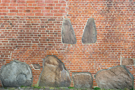 Wall of the St. Severin church in Keitum on the island of Sylt with the two tombstones of the sisters Ing and Dung