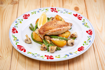 grilled chicken and baked potatoes