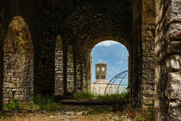 Fototapeta premium clock tower visible in the arch of the building