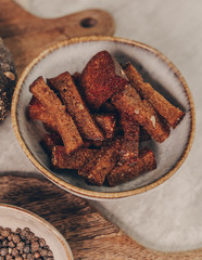 Tasty fried bread garlic sticks. Rustic photo.