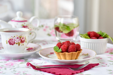 Mini tart with raspberries fruits on the table
