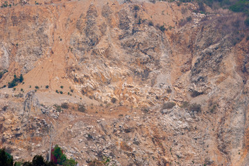 Mining zone in exploitation of minerals, destruction of mountain outdoors in Guatemala City, urban...