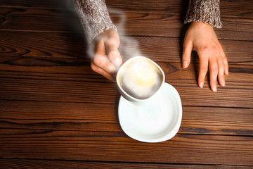 a female hands and coffee