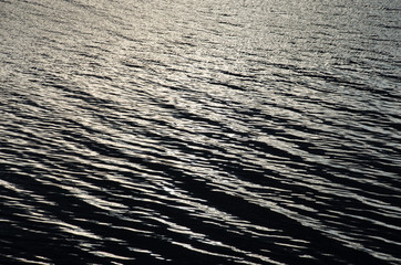 Salt water surface with small waves. Natural background.