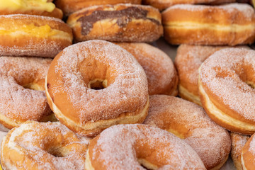 German donuts or krapfen with cream closeup, custard krapfen, sweet donuts