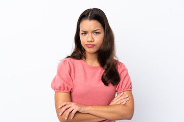 Obraz premium Young Colombian girl over isolated white background feeling upset