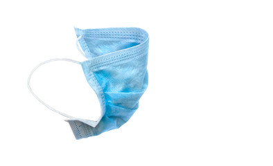 Blue disposable breath mask in profile on a white background. Protection from virus, bacteria, coronavirus 2019