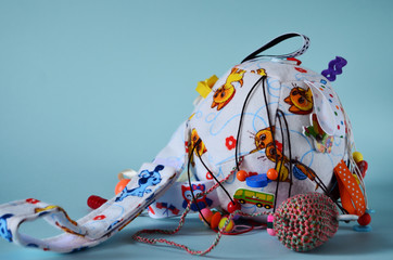 Obraz premium developing a ball for kids with pendants of different shapes and sizes multicolored