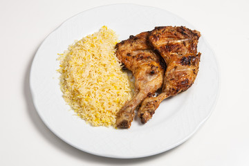 Chicken legs and rice.